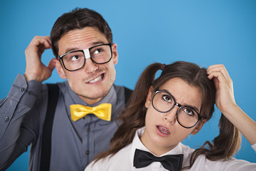Portrait of wondering nerdy couple