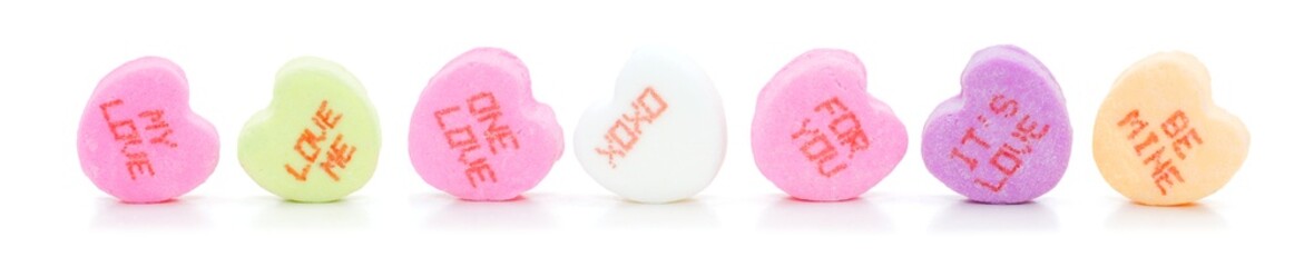 Row of Valentines Day Conversation hearts with various text