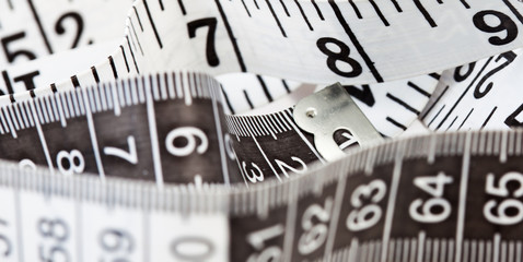 Measuring tape, symbol of tailoring and diets
