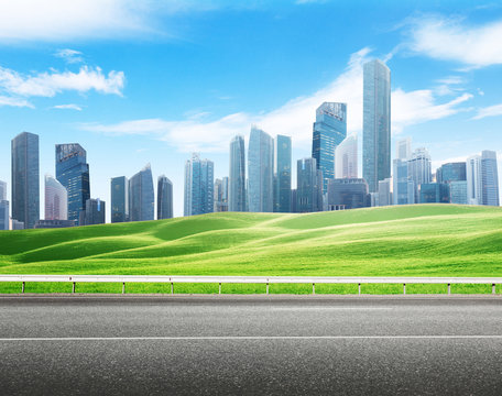 Asphalt road and modern city