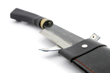 Machete with leather case over white background