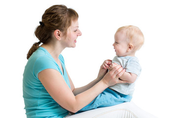 Mother and baby playing isolated on white background. Motherhood