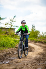 Fototapeta premium Boy cycling