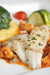 Tasty healthy fish fillet with vegetables