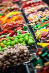 Market stall full of candys in La Boqueria Market.Barcelona