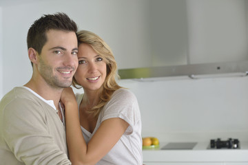 Fototapeta premium Middle-aged couple standing in home kitchen