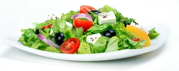 Foto auf Glas Fresh Vegetable salad (greek salad). Useful vitamin food. © primopiano