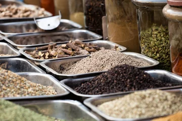  Indian colored spices at local market. © Curioso.Photography