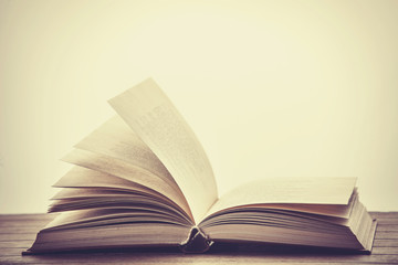 Open book. Photo in old color image style.