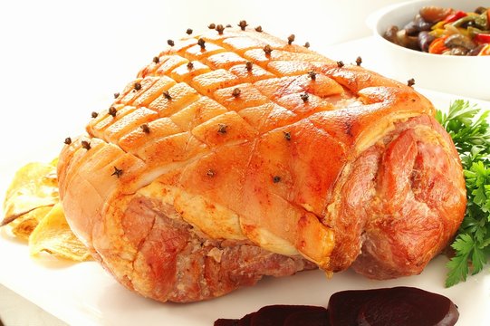 glazed whole ham with vgetables © neillangan