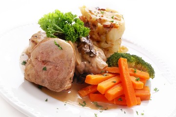roast pork loin with vegetables meal