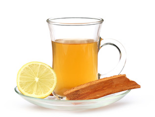 Cup of herbal tea with lemon and cinnamon bark