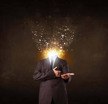 Business man with glowing exploding head