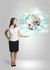 Young woman with earth and cloud concept
