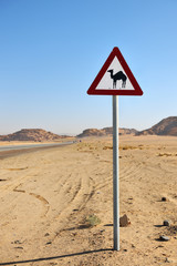 Camels crossing sign in the desert of Wadi Rum