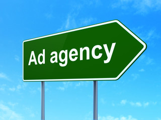 Marketing concept: Ad Agency on road sign background
