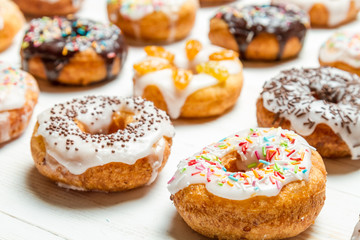 Obraz na płótnie Canvas Group of colored glazed donuts