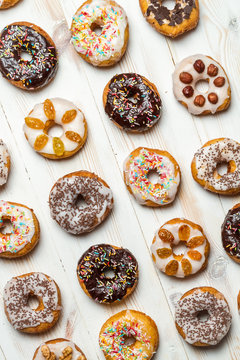 Group of different colorful donuts
