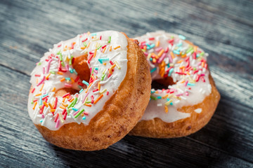 Closeup of donuts with color glaze