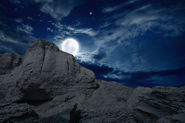 Full moon rises
