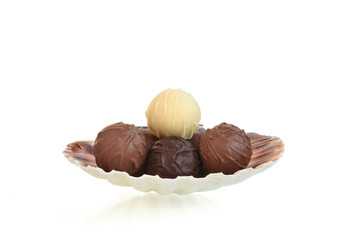assorted praline chocolate in a seashell