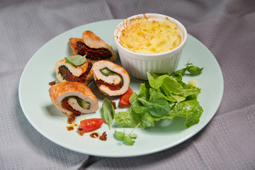 Chicken fillet stuffed with basil, mozzarella and dried tomatoes