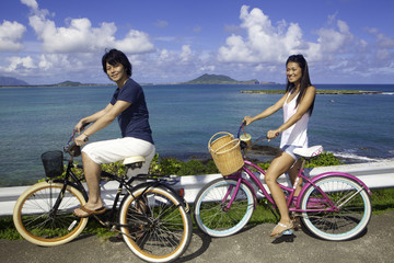 japanese couple on bikes