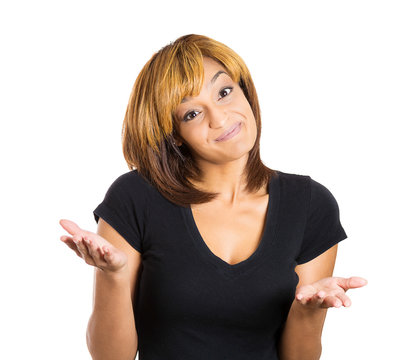 Shrugging woman in doubt doing shrug showing open palms