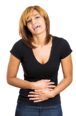 Fototapeta premium Young woman having stomach pain