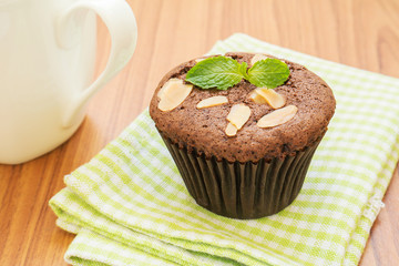Chocolate cupcake with coffee mug