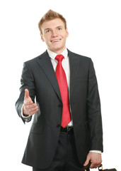 A young businessman giving his hand for a handshake