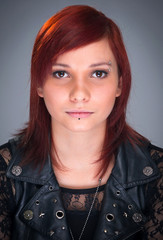 Portrait of trendy teenager in black skin jacket
