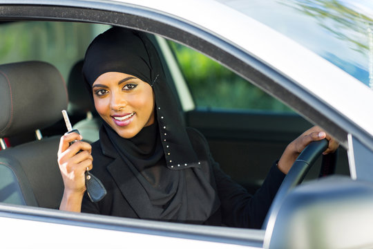 arabian woman holding car key