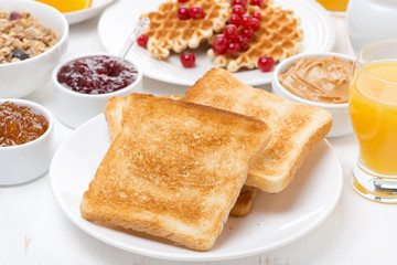 continental breakfast - toast, jam, peanut butter, juice