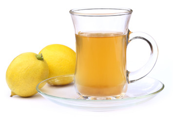 Cup of tea with whole lemon