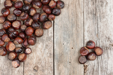 Closeup chestnuts on wooden desk
