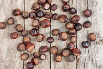 Closeup chestnuts on wooden desk