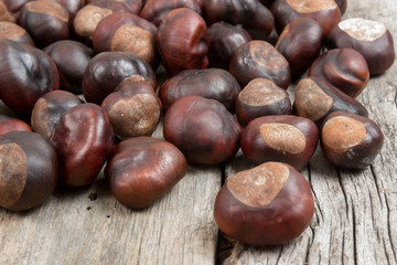 Closeup chestnuts on wooden desk