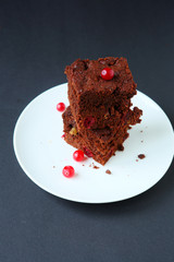 two pieces of chocolate cake