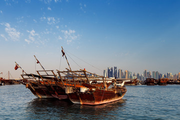 Fototapeta premium Doha, Qatar: Traditional sail boats called Dhows