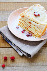 stack of pancakes with berries