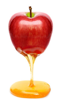 Red apple with honey isolated