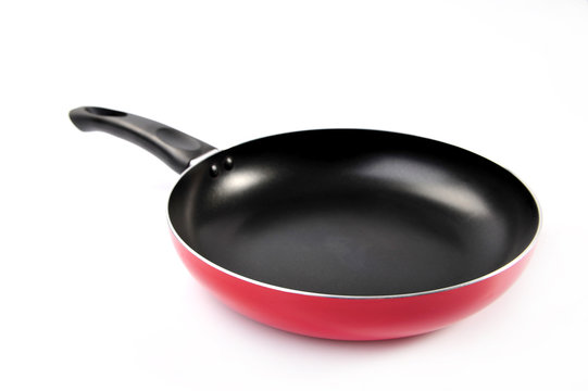 Red frying pan with a nonstick coating
