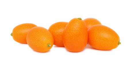 Ripe kumquats on white background