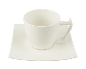 Tea cup over a square plate isolated