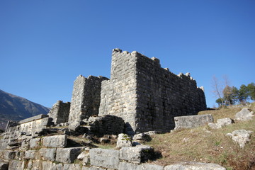 Ancient archaeological site amphitheater or amphitheatre  in Dodoni in Greece with stone seats and steps