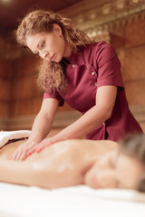 Pretty young woman having a massage