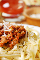 Pasta bolognese on the wooden table