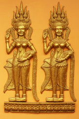 Cambodia golden carving  on the wall
