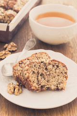 Fruit and nut cake and cup of tea